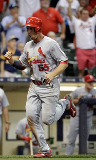 Late throwing error lifts Cardinals to 6-5 win over Brewers